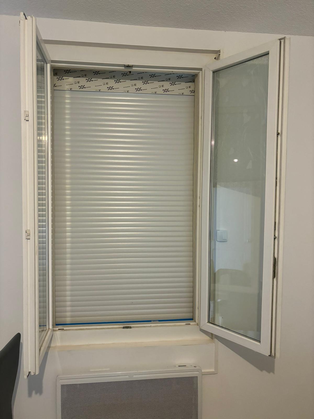 Installation rideau métallique